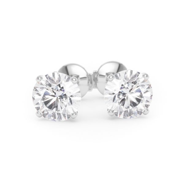     A pair of four-prong diamond stud earrings with two 1.50 carat GIA certified diamonds each, total 3.00 carat, in white gold, front view, isolated on a white background