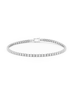     A diamond tennis bracelet in 18k white gold, set with 70 round brilliant cut diamonds totaling 1.02 ct, G SI quality, full view, isolated on a white background
