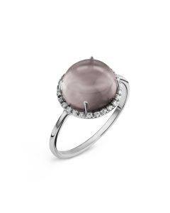 A smoked quartz cabochon and diamonds ring