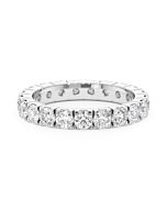 A 2.00 carat diamond eternity ring in 18k white gold, front view, isolated on a white backgroun