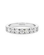     A 0.70 carat diamond half eternity ring in 18k white gold, front view, isolated on a white background