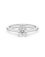 A 0.50 carat diamond four-prong solitaire ring in white gold, front view, isolated on a white background