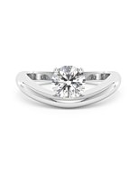     An Océan diamond solitaire ring set with a 1.00 carat GIA certified round brilliant cut diamond in white gold, front view, isolated on a white background
