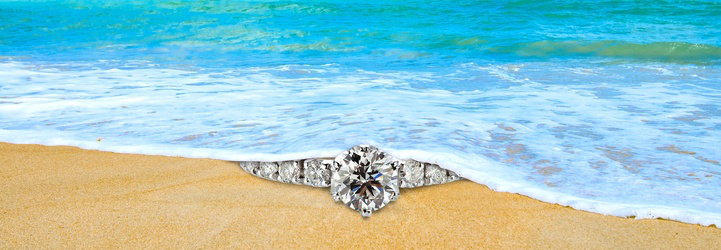 GIA-certified brilliant diamond set in an 18k white gold ring